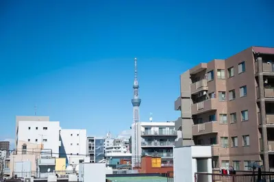 a view of a city with a tall building at Casa401 \u6700\u5bc4\u99c5\u5f92\u6b691\u5206 \u6d45\u8349 \u79cb\u8449\u539f\u8fd1\u304f \u6771\u4eac\u89b3\u5149\u306b\u6700\u9069 \u7a7a\u6e2f\u30a2\u30af\u30bb\u30b9\u826f\u597d \u7121\u6599WIFI in Tokyo