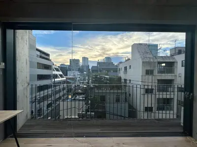 a view of a city from a window in a building at GRASS BLDG 401 in Tokyo