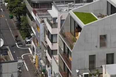 an overhead view of a building with a green roof at GRASS BLDG 501 in Tokyo