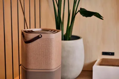 a trash can sitting next to a potted plant at anchorAsakusa Vacation Rental in Tokyo