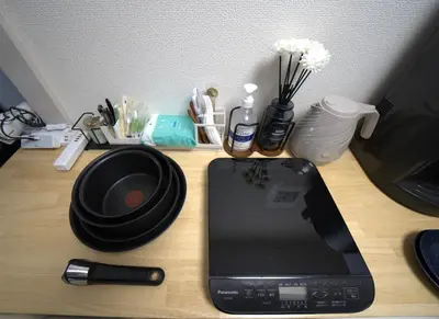 a desk with a laptop and other items on it at 50m 2DK Private Condo!Center of Tokyo!5min Akasaka sta!! in Tokyo