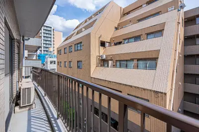 a view from a balcony of a building at KYARA Hotel\u30df\u30b9\u30df401 in Tokyo