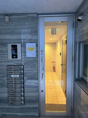 a bathroom with a walk in shower and a glass door at KIYO Skytree Hotel \u9326\u7cf8\u753a\u99c5\u5f92\u6b69\uff13\u5206 in Tokyo