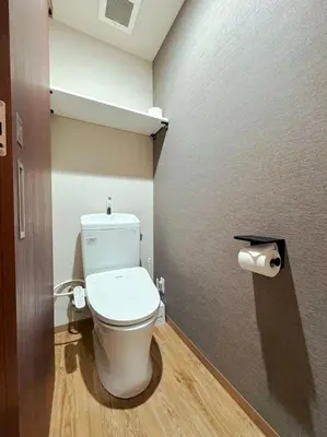 a bathroom with a toilet and a roll of toilet paper at IKEBUKURO TOKIWA 10 BUILDING 6min walk from Ikebukuro Station Direct access to the airport in Tokyo