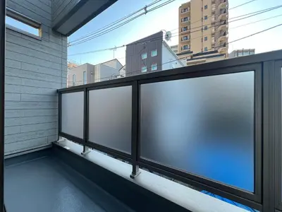 a row of large windows on a balcony at XY-\u6839\u5cb8\u4e00\u6237\u5efa-tTT0107 in Tokyo