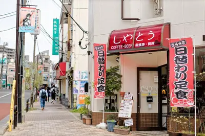 a street with signs on the side of a building at Tokyo Kitaku hotel in Tokyo