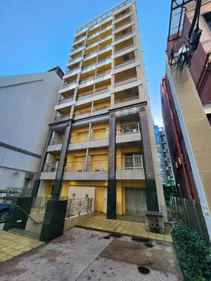 a tall building with balconies on the side of it at LiVEMAX Claudia Akasakamitsuke in Tokyo