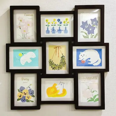 a group of framed pictures of flowers and animals at miyabi I - \u96c5 I in Tokyo