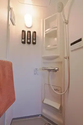 a refrigerator with its door open in a bathroom at V Close to Olympic Stadium Sendagaya Roof top Terrace in Tokyo