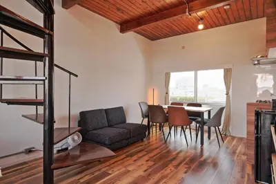 a living room with a couch and a table at V Close to Olympic Stadium Sendagaya Roof top Terrace in Tokyo