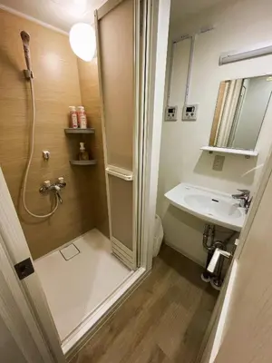 a bathroom with a shower and a sink at miyabi 4 - \u96c5 4 in Tokyo