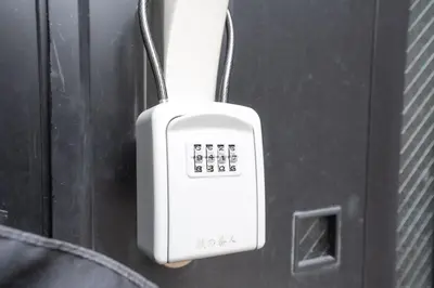 a white object is attached to a door at 7House in Tokyo