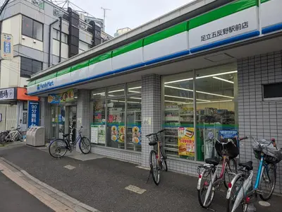 a group of bikes parked outside of a store at 7House in Tokyo