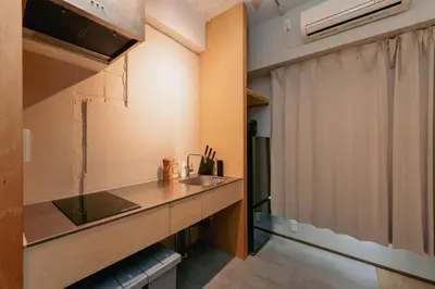 a kitchen with a sink and a counter top at Eminaz Minami Otsuka 2F in Tokyo