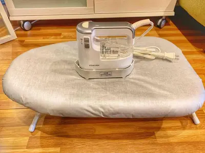 a sewing machine sitting on top of a stool at Shibuya sta 3min\u30fbcenter area\u30fbSwitch\u30fbPocket Wi-Fi in Tokyo
