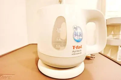 a white mixer sitting on top of a table at Shibuya sta 3min\u30fbcenter area\u30fbSwitch\u30fbPocket Wi-Fi in Tokyo
