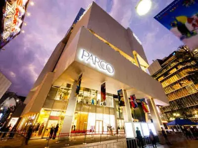 a jaguar store in a city at night at Shibuya sta 3min\u30fbcenter area\u30fbSwitch\u30fbPocket Wi-Fi in Tokyo