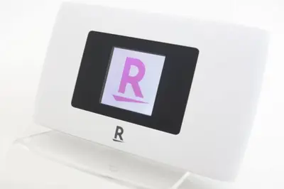 a black and white sign with the letter r on it at Shibuya sta 3min\u30fbcenter area\u30fbSwitch\u30fbPocket Wi-Fi in Tokyo