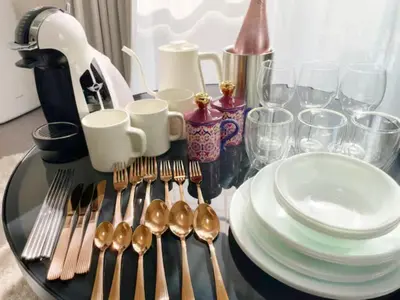 a table with forks and spoons on a glass table at Ikejiri Ohashi Sta 10min walk,Nakameguro 10 min walk,Switch in Tokyo