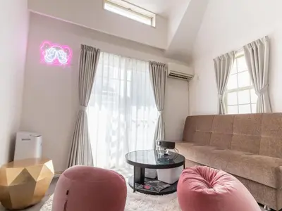 a living room with a couch and a table at Ikejiri Ohashi Sta 10min walk,Nakameguro 10 min walk,Switch in Tokyo