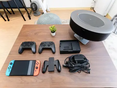 a table with a video game controller and consoles at Ikejiri Ohashi Sta 10min walk,Nakameguro 10 min walk,Switch in Tokyo