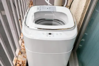 a white toilet in a bathroom with a door at Lucky Horikiri - \u30e9\u30c3\u30ad\u30fc\u5800\u5207 in Tokyo