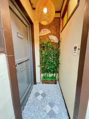 a hallway with a door and a plant at Shobi Building 2 208 - Vacation STAY 16685 in Tokyo