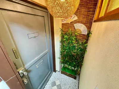 a door leading into a hallway with plants next to it at Shobi Building 2 208 - Vacation STAY 16685 in Tokyo
