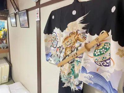 a shirt that has a baseball bat on it at Shobi Building 2 208 - Vacation STAY 16685 in Tokyo