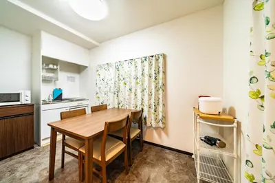 a kitchen and dining room with a table and chairs at 84-5, Shiomi 301, Entire room for rent, \u6f6e\u898bB301 in Tokyo