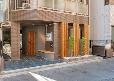 a facade of a building with a store front at Six7 Asakusa Ryogoku in Tokyo