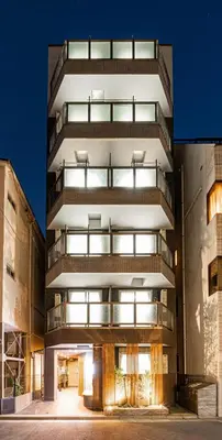 a large apartment building with a lot of windows at Six7 Asakusa Ryogoku in Tokyo