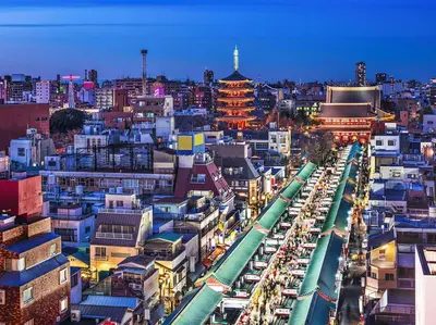 a view of a city at night with buildings at Anshin oyado Tokyo Man Akihabara in Tokyo