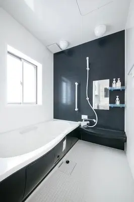 a bathroom with a large white tub and a window at \u3077\u3075\u304b\u5927\u5cf6 in Tokyo