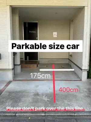 a sign that says park over the entrance to a building at \u3077\u3075\u304b\u5927\u5cf6 in Tokyo