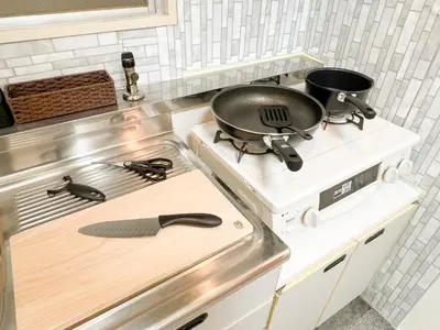 a frying pan on a stove in a kitchen at Kuramae HK 501 in Tokyo