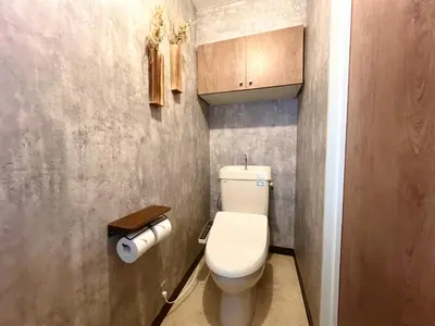 a small bathroom with a white toilet in a room at Kuramae HK 501 in Tokyo