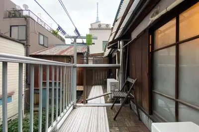 a balcony of a house with a chair on it at Konoha House - Vacation STAY 11581v in Tokyo