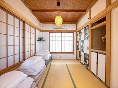 a room with four bean bags in a room with windows at Eden House - Vacation STAY 16713 in Tokyo