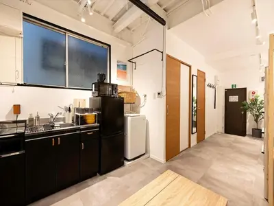 a kitchen with a sink and a refrigerator at Eden House - Vacation STAY 16712 in Tokyo