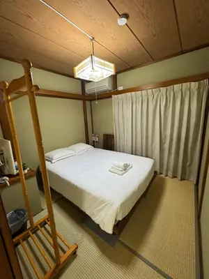 a bedroom with a bunk bed and a window at 3 bedrooms entire house in Tokyo