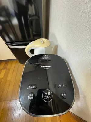 a close up of a coffee machine on the floor at 3 bedrooms entire house in Tokyo