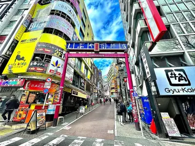 a street in a city with many buildings at Hokusai's House Shibuya Dogenzaka 311 in Tokyo