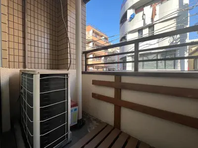 an empty balcony with a window and a metal radiator at \u6771\u7530\u7aef2F-kKI0064 in Tokyo