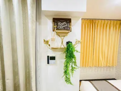 a room with a chalkboard on the wall with a green wreath at \u6771\u7530\u7aef2F-kKI0064 in Tokyo