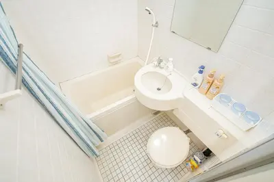 a bathroom with a toilet and a sink and a tub at Shinjuku Takadanobaba 6 mins walk 2BR Room201 in Tokyo
