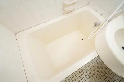 a bathroom with a white tub and a toilet at Shinjuku Takadanobaba 6 mins walk 2BR Room201 in Tokyo