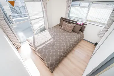 an overhead view of a bed in a room at Shinjuku Takadanobaba 6 mins walk 2BR Room201 in Tokyo