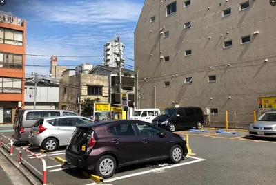 a group of cars parked in a parking lot at Ueno Iriya Hotel in Tokyo