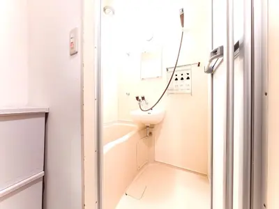 a bathroom with a sink and a toilet at Shinjuku,Ushigome Yanagicho Sta 1min walk , Kabukicho3min in Tokyo